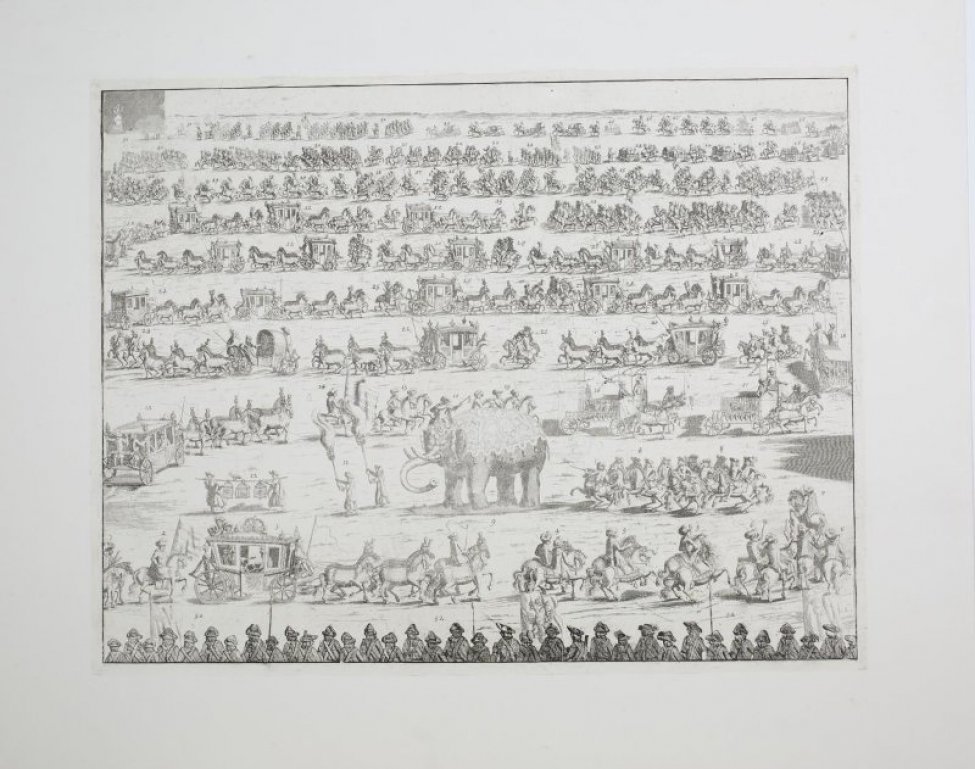 Изображена процессия, в котором участвуют : кареты, запряженные цугом, конные всадники,слон, клетки со львами.